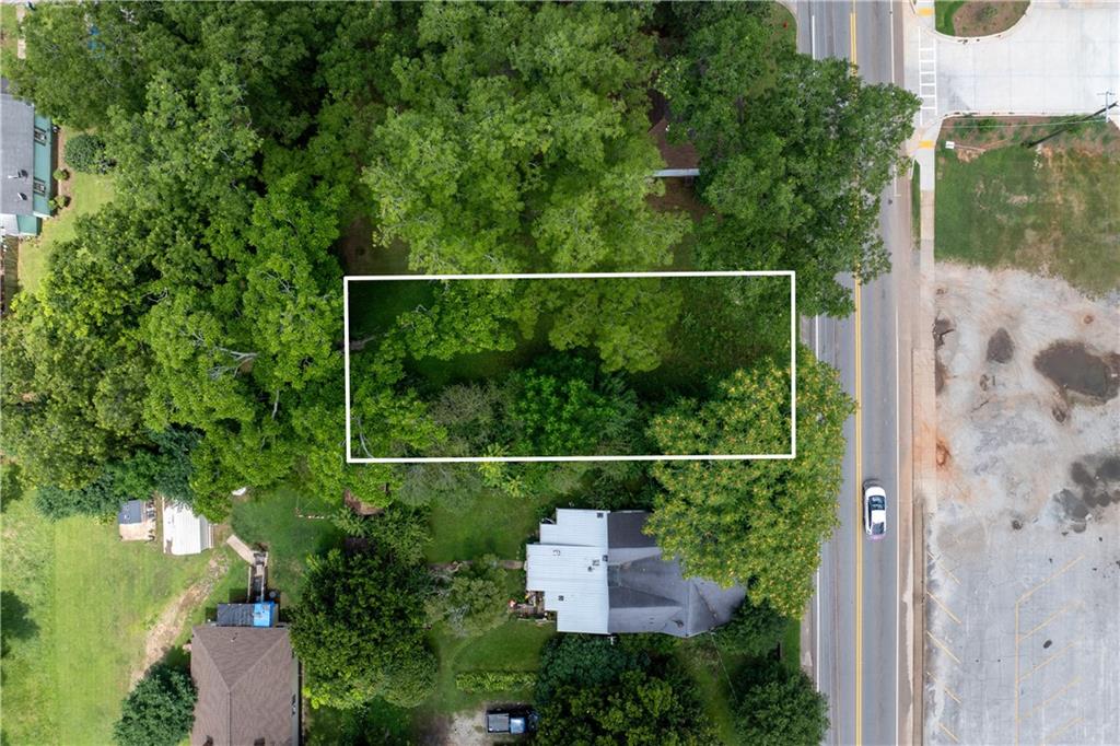 Dreaming of building your perfect home or launching your next investment in a location that blends convenience, charm, and potential? This spacious, level lot in the heart of Griffin's historic Edwards subdivision invites you to create something truly special. Nestled on a paved, city-maintained street with direct frontage, this parcel offers easy access to public water, sewer, electricity, high-speed internet, and cable—everything ready and waiting to support your vision.
Surrounded by mature homes and new construction, the community is rich with local character, schools, parks, and growing development—making this an ideal spot for a primary residence, rental property, or build-to-sell opportunity. With no HOA restrictions or fees, you're free to design without limitation. Whether you’re inspired to craft a cozy cottage or a modern retreat, this clean, tree-sparse lot provides a clear canvas and strong potential for future value. Just minutes from downtown Griffin, restaurants, and shopping, the location blends peaceful neighborhood vibes with accessibility.
Come see the future you can build on this beautiful piece of Georgia soil—opportunity is calling on Experiment Street.
