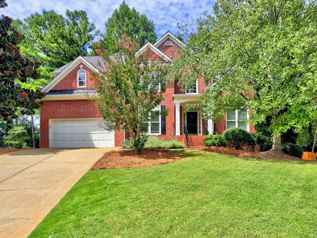 Updated traditional on private cul-de-sac in walkable Northampton! Formal liv/dining rooms, office with French doors and Master on Main! Kitchen with stainless steel appliances and wine cooler bar area opens to two story great room with fireplace and built in cabinetry! Master bedroom suite with Upgraded master bath with newer tile shower and walk in closet! Three unique upper-level bedrooms and full bath! Terrace level features 3 large rooms, full bath, workshop area and plenty of additional storage! Hardwood floors throughout main level, newer carpet and paint! Large level wooded lot, newer cement siding and gutters! Close to schools, shopping, Cobb aquatics and tennis and parks, library, arts and senior center!