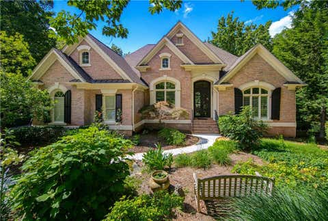 Homes For Sale - 7090 Laurel Oak Drive<br/> Suwanee, GA 30024