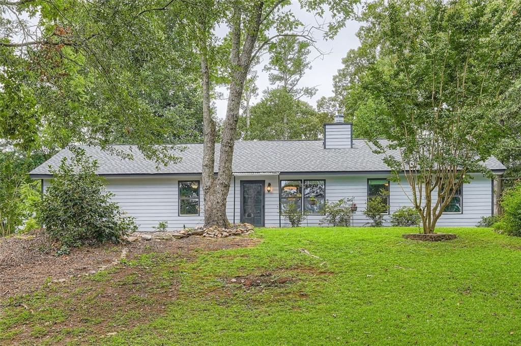 ** Receive up to $7,000 in down payment assistance and appraisal credit up to $500 with our preferred lender, Modern Home Mortgage making homeownership more affordable than ever! ** This beautifully updated 5-bedroom, 4-bath home offers incredible flexibility perfect for first-time homebuyers or investors. Enjoy a modern kitchen with upgraded finishes, fully renovated bathrooms, and fresh interior paint throughout. With two full kitchens and potential for a third, this home is ideal for multi-generational living or rental income opportunities. The spacious layout is great for entertaining, and the large, private backyard sits in a quiet, established neighborhood. The roof is just 2 years old, and all major updates have been completed. Prime location minutes from Downtown Lawrenceville, walking distance to shopping, and easy access to Hwy 316 and I-85. Don’t miss this opportunity and schedule your tour today! ** Please remove shoes or use the provided booties when entering the property. **