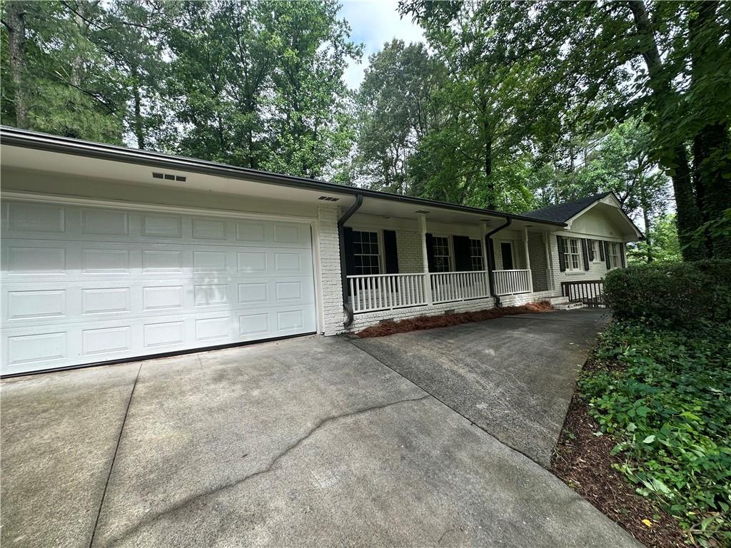 STUNNING HOME LOCATED IN HIGHLY SOUGHT AFTER DUNWOODY! CONVENIENT TO 75 AND 285! THIS HOME HAS TOO MUCH TO LIST! 5 BEDROOM/3 FULL BATHS PLUS SECOND FULL KITCHEN OR IN LAW SUITE OPTION! HOST FAMILY AND FRIENDS ON THE OVERSIZED BACK DECK! THE LARGE SCREENED IN PORCH IS PERFECT FOR RELAXING! BEAUTIFUL WHITE CABINETS IN KITCHEN AND GRANITE COUNTERTOPS DISPLAY BRAND-NEW STAINLESS-STEEL APPLIANCES! GORGEOUS HARDWOOD FLOORING THROUGHOUT MAIN FLOOR! OVERSIZED MASTER SUITE HAS BEEN UPDATED WITH NEW TILED SHOWER! NEW PAINT, NEW LIGHT FIXTURES, AND PLUMBING THROUGHOUT HOME! BASEMENT OFFERS ADDITIONAL BONUS ROOM/GAME ROOM TO HOST GUESTS! THIS IS DEFINITELY A MUST SEE TO BELIEVE! YOU DON'T WANT TO MISS OUT ON THIS ONE BECAUSE IT WILL BE GONE FAST!