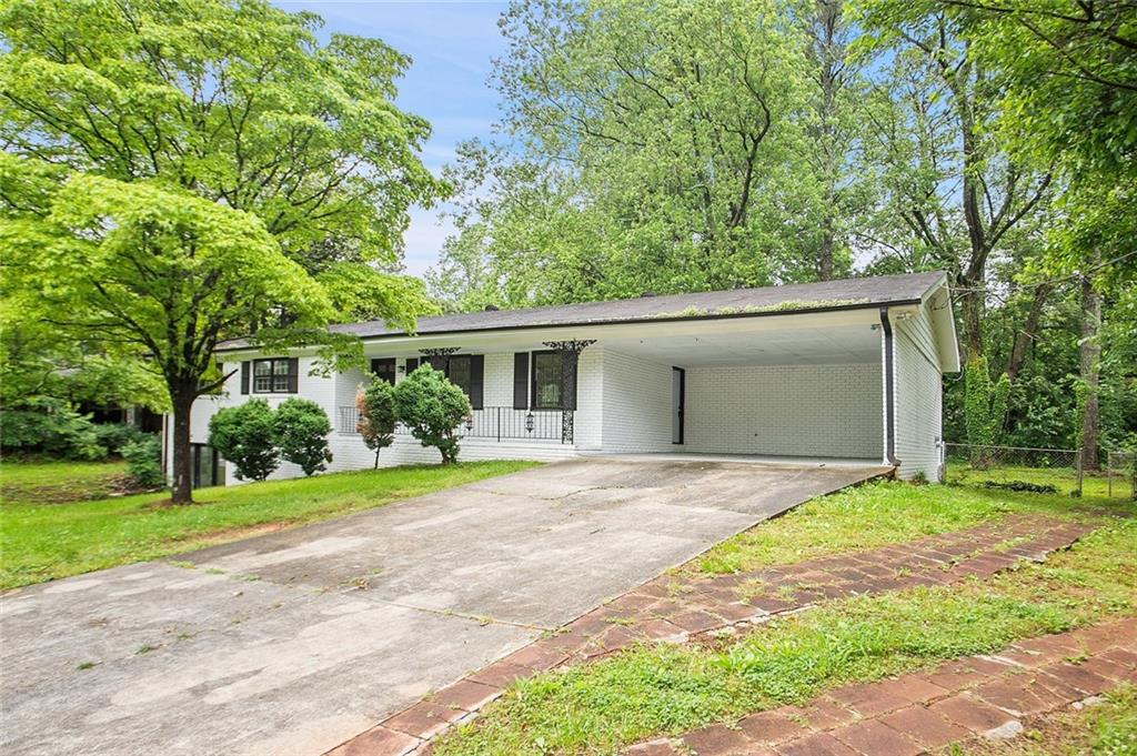 Imagine calling this beautifully renovated brick ranch in sought-after East Cobb, Marietta your new home. Forget the hassle of renovations – it's already done! Step inside onto gleaming hardwood floors that flow through the spacious, open main living area. You'll find three comfortable bedrooms and two fully updated bathrooms with modern fixtures and tile on this level.
The heart of the home, the kitchen, is brand new with stylish cabinets, a lovely backsplash, and durable countertops. Need more space? The finished basement is a fantastic bonus, offering a large rec room, another bedroom, and a full bathroom – perfect for guests, a home office, or a play area!
Outside, enjoy coffee on the front porch or host barbecues on the back patio overlooking the yard. Located in a top-rated school district and close to parks, shopping, and dining, this home offers the perfect blend of comfort, style, and convenience. Don't miss this chance for a truly move-in-ready home in a prime location! Schedule your visit today.
