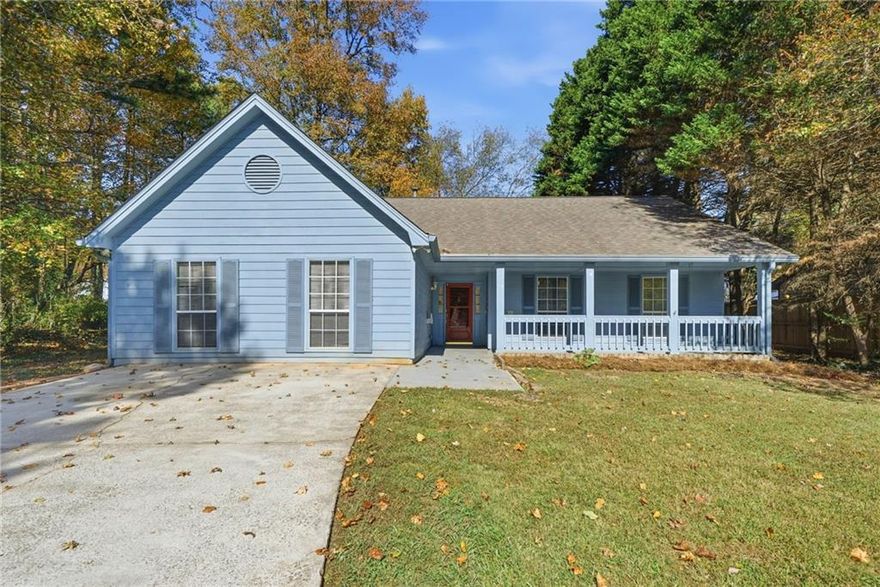 Charming 4 bed 2 bath home in Snellville. This ranch sits on a slab and offers more space than you might expect from the outside. The living room opens up with high ceilings that create a grand feel, while the masonry fireplace adds a warm touch. The kitchen is all white with a bright and clean look. The primary suite is generous in size with tray ceilings, an ensuite bath with a separate tub and stand alone shower, and a spacious walk in closet. Other highlights include a covered front porch, a rear patio, and a private backyard.