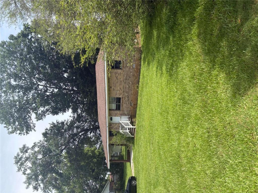 Welcome to your next beautiful all brick ranch with real hardwood floors throughout the home on a large end lot. This is a fixer upper with the potential to customize to your desire with a large kitchen for the whole family to enjoy. On a Supra lockbox. Please schedule appointment in Showingtime.