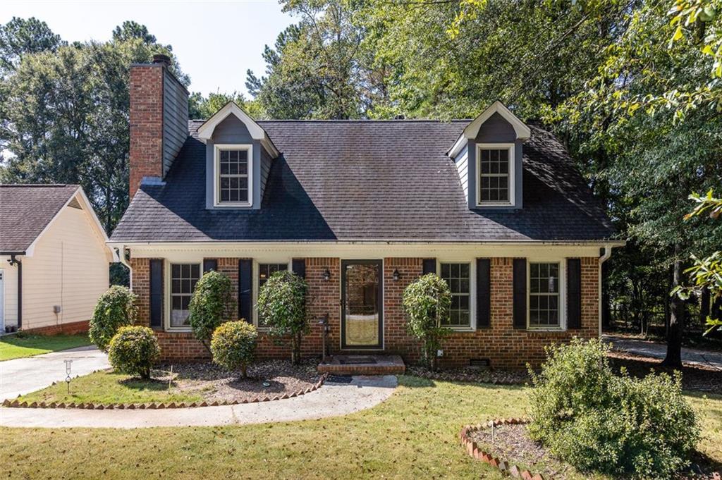 Welcome to 4357 Erskine Road, a charming Cape Cod bungalow nestled in the heart of vibrant Clarkston, GA! This cozy 3-bedroom, 2-bathroom residence, built in 1986, offers 1,400 sq ft of comfortable living space on a 0.2-acre lot, perfect for those seeking a blend of modern convenience and suburban tranquility. The property’s prime location provides easy access (directly across the street!) to the PATH bike and pedestrian trail system, ideal for outdoor enthusiasts. You’re just minutes from downtown Clarkston, Stone Mountain Park, and major highways I-285 and 78, offering a perfect balance of serene living and urban connectivity. Nearby cultural markets, restaurants, and Refuge Coffee Company add to the area’s unique charm. Additional features include a 2 car detached garage, tankless water heater, and low annual taxes. This move-in-ready gem is perfect for first-time buyers, small families, or investors looking for a property in a diverse and welcoming community. Don’t miss the opportunity to own a piece of Clarkston’s charm!