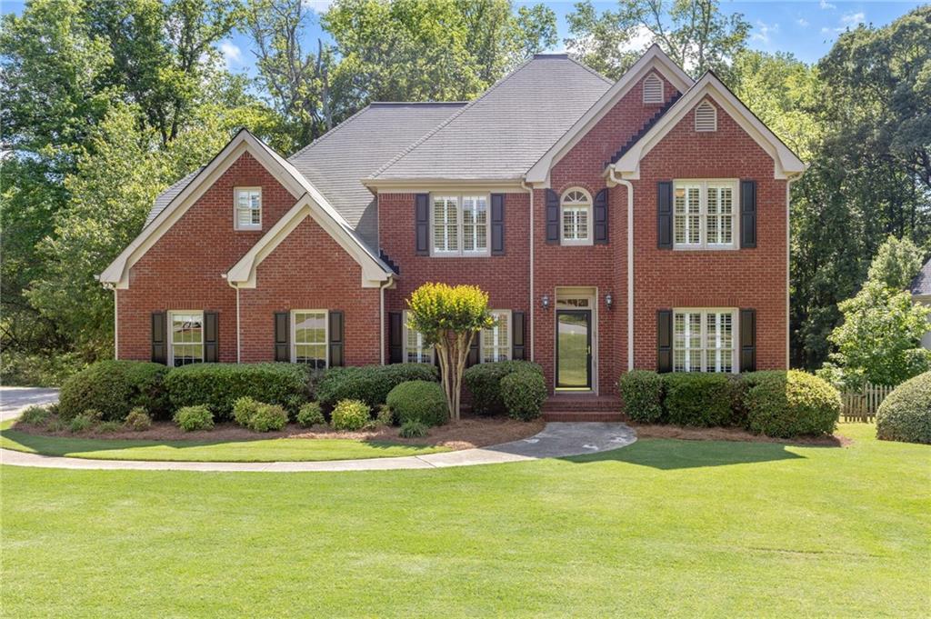 Stunning, move-in-ready home in the highly desirable Chartwell community—walking distance to neighborhood amenities and top-rated Forsyth County schools, including Lambert High School! Situated on just over a ½ acre lot, this beautifully maintained property offers space, privacy, and modern updates throughout. Enjoy peace of mind with a BRAND-NEW HVAC unit and furnace for the main level, along with FRESH INTERIOR PAINT, NEW CARPET and updated lighting. The main level features walnut-stained hardwood floors, a bright and open layout, a private office, banquet-sized dining room, and an expansive great room. The updated kitchen boasts granite countertops, stainless steel appliances, a large island with seating and extra storage, plus a spacious walk-in pantry. Upstairs, the oversized primary suite includes a sitting area overlooking the private backyard, a large walk-in closet, and a spa-like bath with walk-in shower and double vanities. Three additional bedrooms offer high ceilings and walk-in closets. Outside, enjoy an extended deck, a fenced backyard, and a spacious side-entry garage with a large driveway—all on a generous and private lot just over 0.5 acres. Don’t miss your chance to own this updated gem in one of South Forsyth’s most established neighborhoods withing walking distance of top-rated Lambert High School.