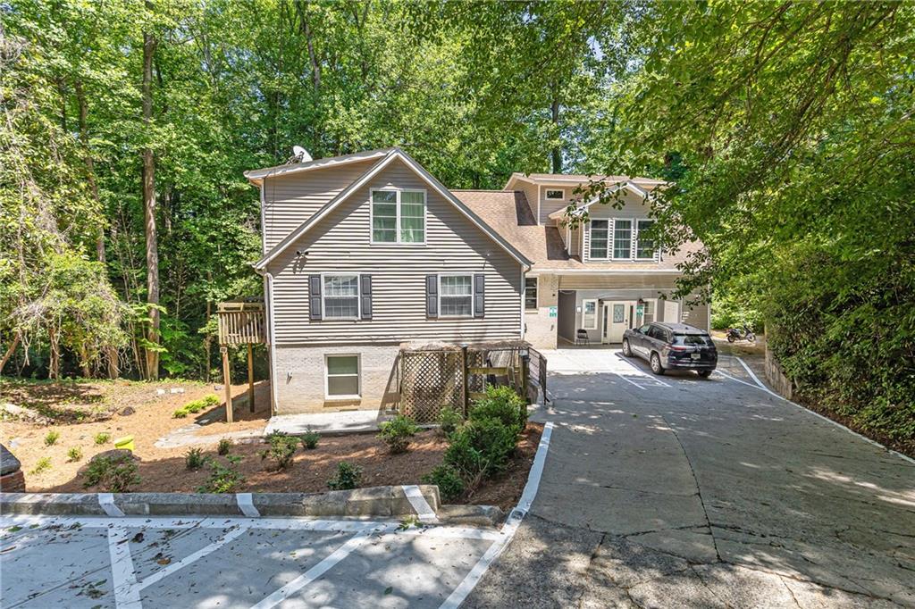 AMAZING CASH FLOW INVESTOR OR DEVELOPER OPPORTUNITY IN LAVISTA PARK! SIX UNIT BUILDING (4) 2BRs & (2) 1/1. Centrally located and on quiet cul de sac! WALKABILITY. Whole Foods & Starbucks, Publix & many amenities nearby. Close to Buckhead, Morningside, VA Highlands, Druid Hills, Emory, CDC & Brookhaven! Mins to I-85, GA 400 & public transportation. Individually metered power, shared laundry in basement. Tenants pay power, but landlord currently pays water and gas. New landscaping, driveway lights, extended parking pad, and added parking with number signs.