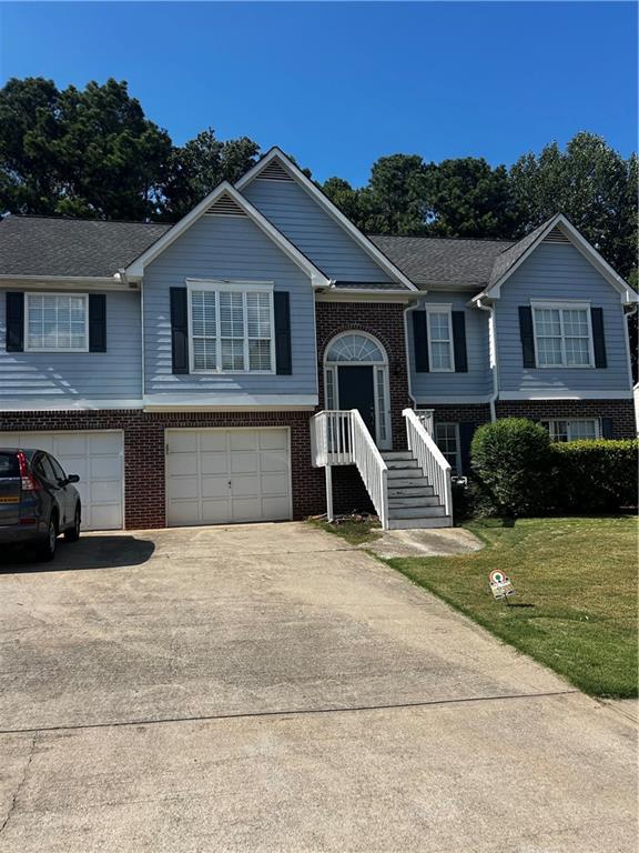 Welcome to this beautifully maintained split level home in the Centennial Place Community. This home offers exceptional schools, access to I575, shopping, restaurants and is minutes from downtown Woodstock. The main floor of this split-level home offers a private entrance, three bedrooms, two baths, a one-car garage and private deck. Gas, electricity and water are included in this rental. Swimming, tennis and playground included.
