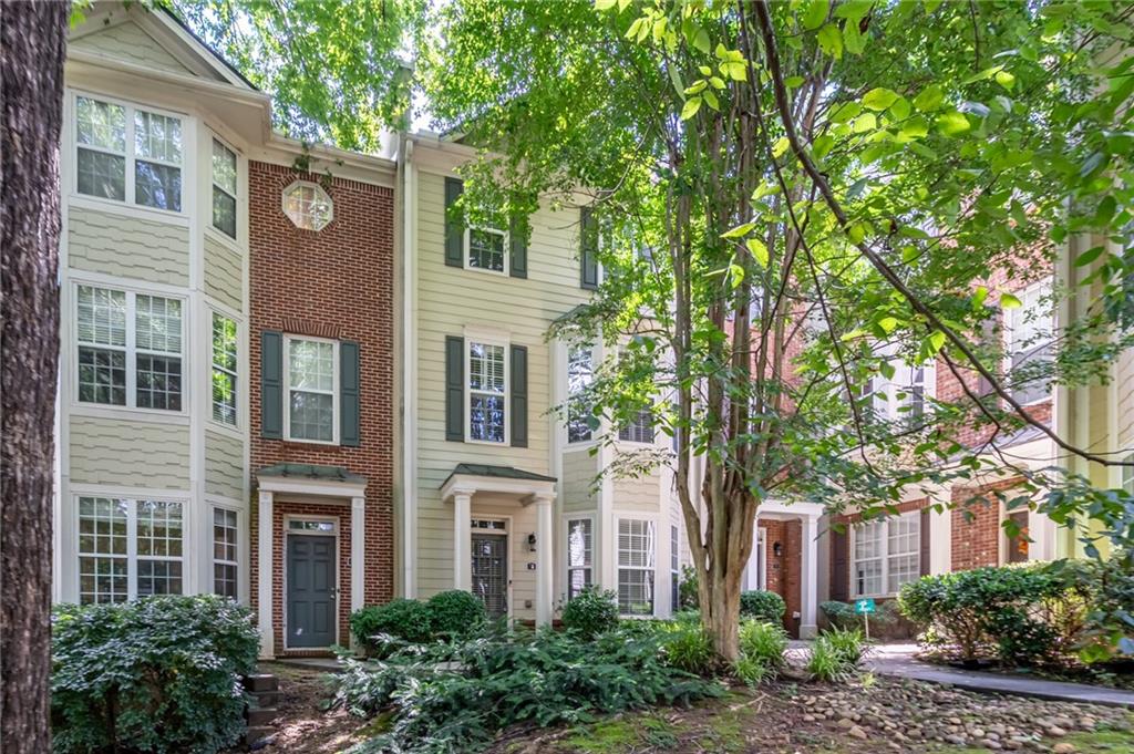 Move-in ready, spacious and freshly painted 3-bedroom, 3.5-bath townhome offering flexible living and plenty of natural light throughout. Featuring beautiful hardwood floors and crown moldings. The entry-level offers a versatile flex space—perfect as an office, guest suite, or media room—with its own full bath. Upstairs, the main level boasts a large living room with fireplace, a separate dining room with charming bay windows, and a well-equipped kitchen with stainless steel appliances, Corian countertops, walk-in pantry, and ample cabinet space. A convenient half bath completes the main floor. The upper level features a spacious primary suite with en-suite bath, double vanity, and large walk-in closet. A secondary bedroom with its own full bath and a laundry room complete with washer and dry are also located upstairs for added convenience. Enjoy relaxing or entertaining on the oversized deck. The home also includes a garage and generous storage throughout. Situated in a small, well-maintained community with low HOA fees. Unbeatable location close to everything Decatur has to offer with easy access to Emory, the CDC, and downtown Atlanta. You are just around the corner from Starbucks, Whole Foods, Sprouts, and LA Fitness. Decatur's Glenlake Park is also only a couple of blocks away with its huge pool, Tennis Center with multiple courts, playground, basketball court, and dog park.
