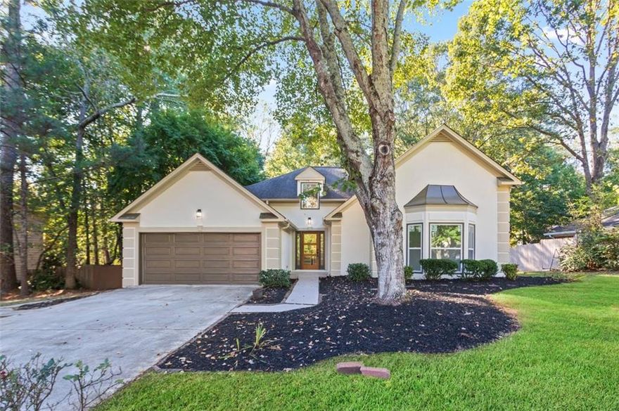 This stunning home combines modern design, space, and comfort throughout. Exterior upgrades include
professional landscaping, fresh paint, and a spacious patio overlooking a large private backyard-perfect for
entertaining or relaxing. Step inside to an open floor plan with new White Oak Somerville LVP flooring, a 9-ft
white quartz waterfall island, natural oak 42" Belgrade cabinets, SS appliances, and a rebuilt gas log
fireplace. The main-level owner's suite offers a spa-like bath with soaking tub, frameless glass shower, and
expanded walk-in closet. Lower level features a private office w/French doors, guest bedroom & full bath.
Terrace level adds 2 additional bedrooms, full bath, and flex space ideal for media, fitness, or family room.
Additional upgrades include new insulated windows, iron stair railings, designer lighting, updated electrical &
plush new carpet. A true showcase of modern luxury and functionality! Schedule a showing today !!! THIS
HOME WILL NOT LAST LONG! Exceptional neighborhood, and close proximity to stores, food and
entertainment.