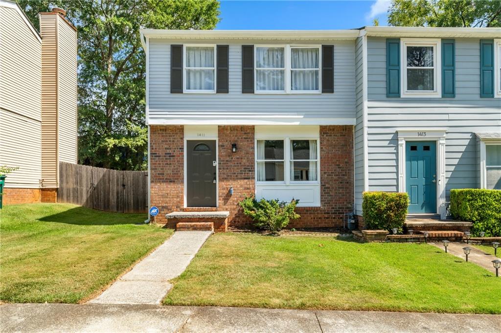 Welcome to this charming 2-bedroom, 2.5-bathroom end-unit townhome, ideally situated near top-rated schools, shopping, dining, and public transportation. Step inside to find fresh paint, stylish new flooring, and thoughtfully updated finishes throughout. The bright and airy kitchen features butcher block countertops, ample cabinet space, and natural light that enhances the warm, inviting feel of the home. The spacious living area includes built-in shelving, perfect for displaying books or décor. Upstairs, you’ll find generously sized bedrooms with ample closet space and updated baths. Step outside to your private fenced yard with a rear porch—ideal for morning coffee or evening relaxation. This move-in ready home offers the perfect blend of comfort, style, and convenience in a sought-after Smyrna community!