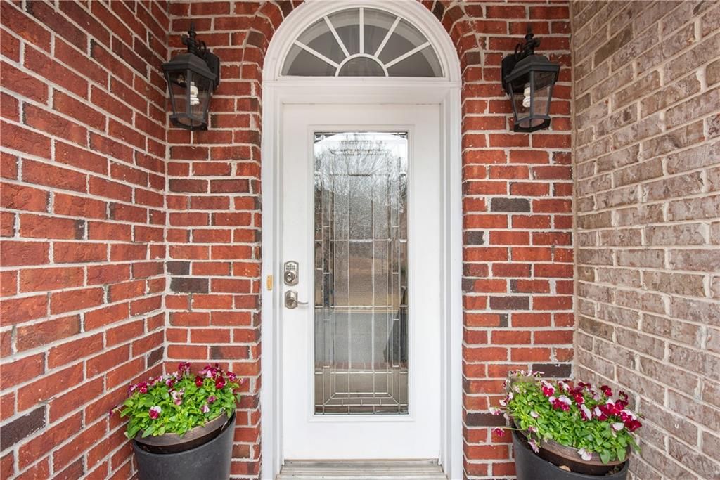 Photo of 12825 Doe Drive, Alpharetta, GA 30004 (MLS # 7705143)