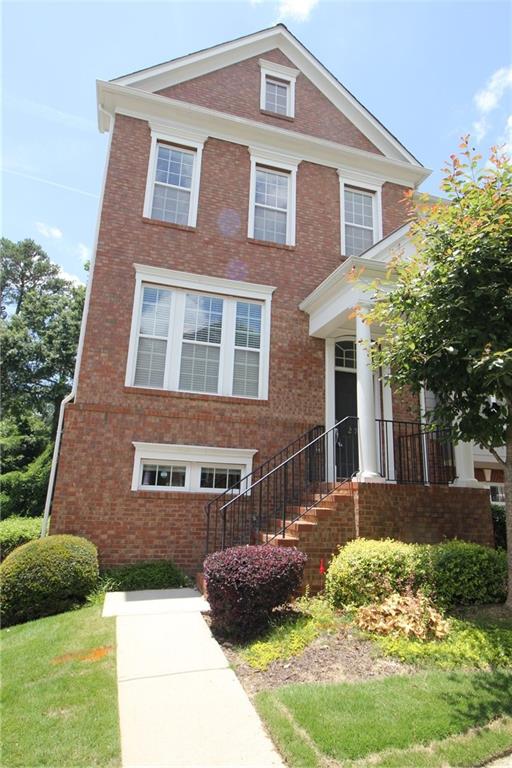 END UNIT best location in community w/ private deck backing to green space in super popular & gated Views at Lenox Crossing. Hardwood floors main level. Great Room w/ corner fireplace. Granite kitchen w/ island,SS appliances,deck access & view of private setting in rear. Two large master suites with trey ceilings and private baths on upper level. Lower level has bedroom with full bath ideal for an office also. 2 car garage. Washer/Dryer included. Community Pool. The Views is close to everything Brookhaven and Buckhead have to offer. Pets Negotiable.