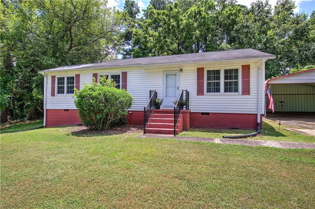 FRESH PRICING! Don't miss out on an exciting price adjustment on this RARE FIND in historic Marietta! With a NEW PRICE TAG & UNBEATABLE LOCATION, we are also offering a generous flooring allowance! Perfectly placed near everything you need; this home combines rare convenience with a close-knit community and small-town feel. This cozy 1950s, 3 bedroom/ 1 bath home sits on a LARGE corner lot overlooking a beautiful yard! Less than a mile to I-75, just a SHORT drive to the Marietta Square, East Cobb, White Water and Truist Park/Battery, this affordable home filled with character is close to schools, shopping, dining and transportation while also being nestled in a small, friendly neighborhood within steps of a community park with a walking path, dog area, and picnic shelters. While it's being sold "as is", this MOVE IN ready home has been taken care of & lived in by the same family for over 60 years. Please don't ignore a unique chance to own a charming, well-maintained home in the heart of Marietta!