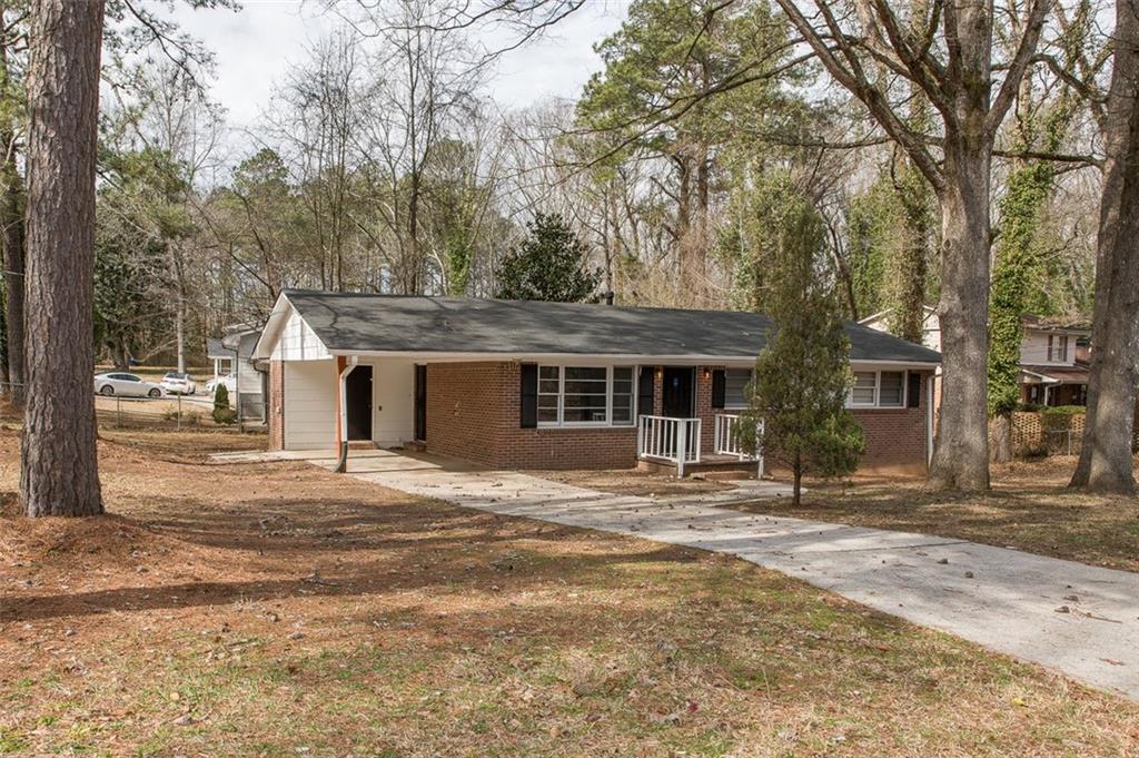 SUMMER Move-In Special - $500 off the 1st month's rent!
Don't miss this charming 3-bedroom, 1.5-bathroom brick home on a desirable corner lot! This home combines convenience and comfort and has a private driveway, a one-car carport, and a spacious yard perfect for relaxing or entertaining. Inside, enjoy the added benefit of a washer and dryer in the unit, along with stunning hardwood floors and ceiling fans throughout.
The kitchen has white cabinets, sleek black appliances, a gas stove, and a dishwasher, making meal prep and cleanup a breeze. Natural light pours into the home's floor plan, creating a bright and inviting living space. The primary bedroom offers a spacious closet.
Located just minutes from the interstate and a short drive to Downtown Atlanta, this home is ideally situated for easy access to everything you need.
This property has an income requirement of under 120% AMI. Please see the last photo.
All Sovereign Realty & Management residents are enrolled in the Resident Benefits Package (RBP) for $35.00/month which includes liability insurance, credit building to help boost the residents credit score with timely rent payments, our best-in-class resident rewards program, on-demand pest control, and much more! More details upon application.