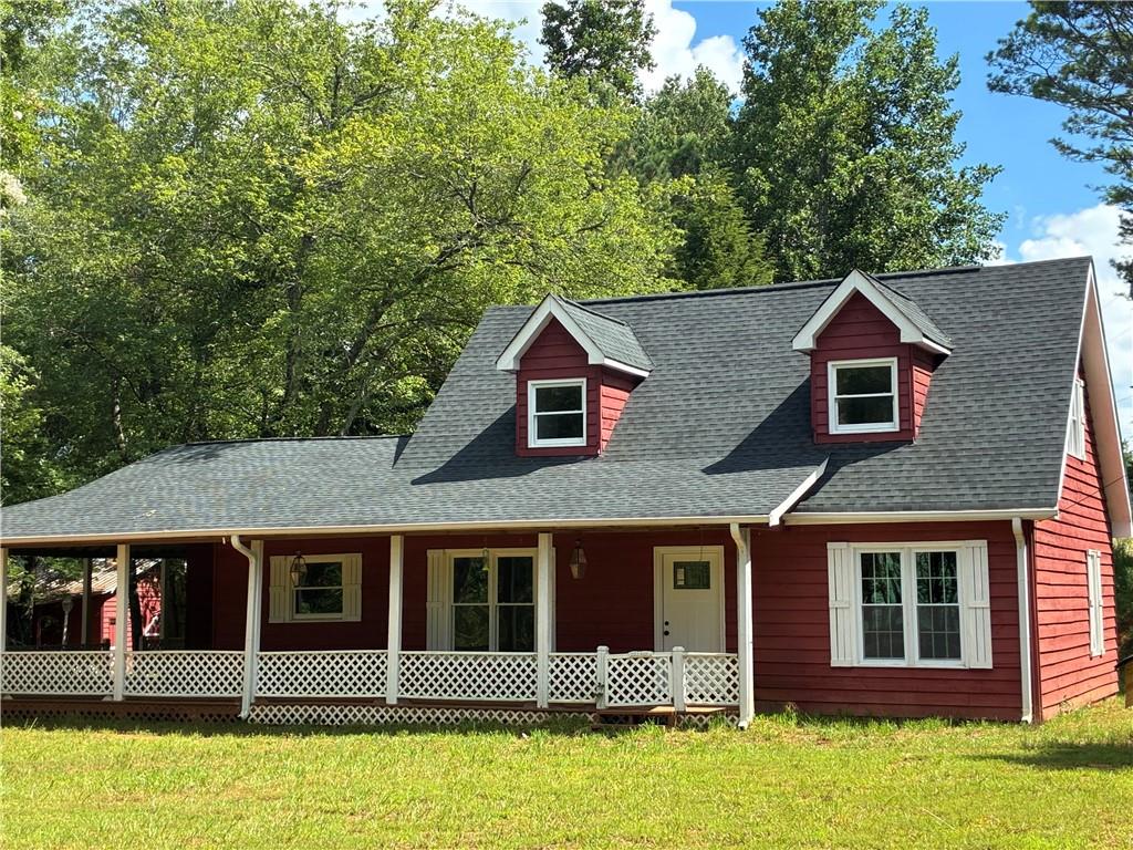 Welcome to Your Affordable Country Oasis!
2.95 acres Nestled at the end of a serene gravel drive, this beautifully updated 3-bedroom, 2-bath home is set on a peaceful, wooded lot
Lovingly refreshed in 2023 and featuring recent upgrades, this property offers both comfort and character.
Key Features
Move-in ready! New roof and HVAC system ensure comfort & peace of mind .
Inviting wraparound porch—perfect for morning coffee or evening gatherings.
Open, level lot with a spacious gravel parking area, ideal for boats, RVs, or farm equipment—zoned Agriculture (A3) with no HOA restrictions
Charming interior: Hardwood, LVP flooring and new carpet, cozy fireplace, built-in bookcases, and a functional mud/laundry room
Barn with power provides extra storage or ready to use workshopl. A separate mobile home on-site offers additional spacefor visiting family, renovation opportunity or additional rental income
Well water, septic tank, central heat & air via heat pump
Great Location & Lifestyle
Enjoy ultimate privacy with mature trees and countryside views, yet remain within reach of local schools (Lanier Elem, Chestatee Middle & High rated 3-5/10)
A perfect retreat for hobby farming, outdoor living, and peaceful weekends.
Zoned A3 for agricultural uses, it’s a rare blend of country charm and modern comfort. Just minutes from school, shopping & dining—schedule a showing today!