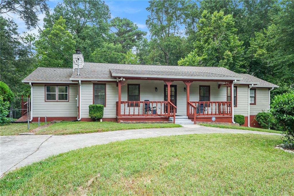 Welcome to your private retreat! This beautifully renovated 3-bedroom, 2-bath ranch sits on over 5 serene acres. Enjoy a bright open layout with updated flooring, fresh paint, modern kitchen finishes, and stylish baths. The spacious primary suite offers comfort and privacy, while the expansive land provides endless possibilities. Perfect for peaceful living with plenty of room to grow!
