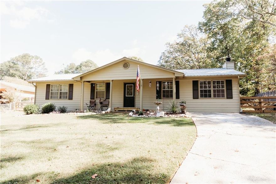 MOTIVATED SELLER........Beautiful house in the very sought after South Forsyth area with end of the street privacy. Top rated school district. 10min drive to multiple malls, but still a quiet setting on the back porch. The home has been meticulously taken care of by the owners for over 22 years. This home offers 3 bedrooms, 2 full bathrooms and an optional office or bonus room. Hardwood floors throughout, wood burning fireplace in the living room, electric stove, dryer, water heater and HVAC with gas hookups at each. Extensive addition added in 2022 with an updated panel box, insulation in the attic, roof, and HVAC. The sitting room on the back of the house offers lots of natural light, and opens up to a beautiful fenced in back yard with a shop and multiple outbuildings. Large enough area to play and have a garden at the same time. No HOA. RECENT APPRAISAL DONE