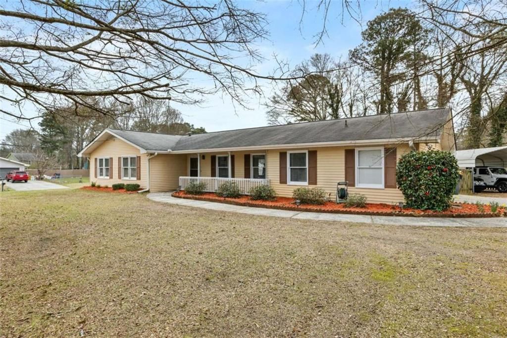 Photo of 1677 Old Peachtree Road, Lawrenceville, GA 30043 (MLS # 7729251)