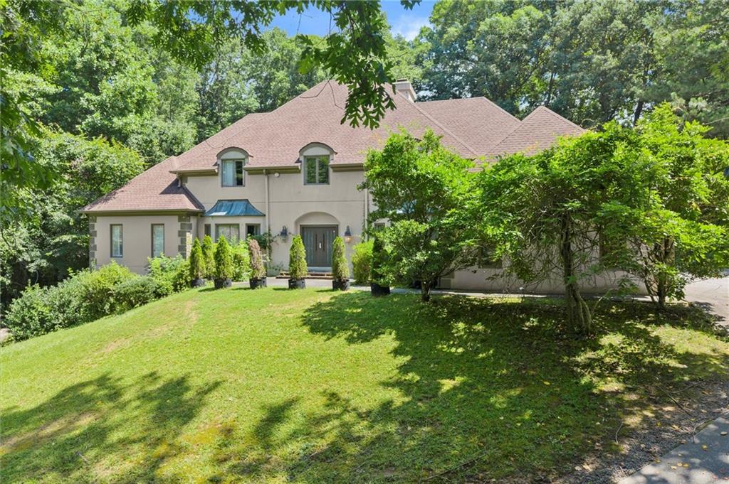 Experience elevated living in the heart of Atlanta. Nestled on over 4 private acres in the exclusive Cameron Glen community, this spacious 6-bedroom, 6-full and 2-half bath estate offers the rare blend of luxury, space, and serenity all just minutes from the city.
Step inside to discover multiple oversized living areas designed for both grand entertaining and everyday comfort. Whether you’re hosting or enjoying quiet moments, there’s room for it all. The layout offers flexibility with formal and informal spaces. The fully finished basement adds even more flexibility, featuring additional bedrooms, a second kitchen, and a full bath making it perfect for guests, multi-generational living, or a private retreat.
Outside, enjoy your own personal escape! This home overlooks a private pond, offering peaceful water views and unmatched privacy. Relax poolside, take in the natural beauty, and imagine the possibilities on this expansive lot. With a 3-car garage, incredible storage, and timeless curb appeal, this home is a true hidden gem with endless potential. Whether you're looking for space to grow, entertain, or simply unwind. This is a rare lease opportunity in one of Atlanta’s most sought-after areas.
If you’ve been searching for privacy, luxury, and space all in one home then this is the one. Reach out today to make 5875 Northside Drive NW your next address!