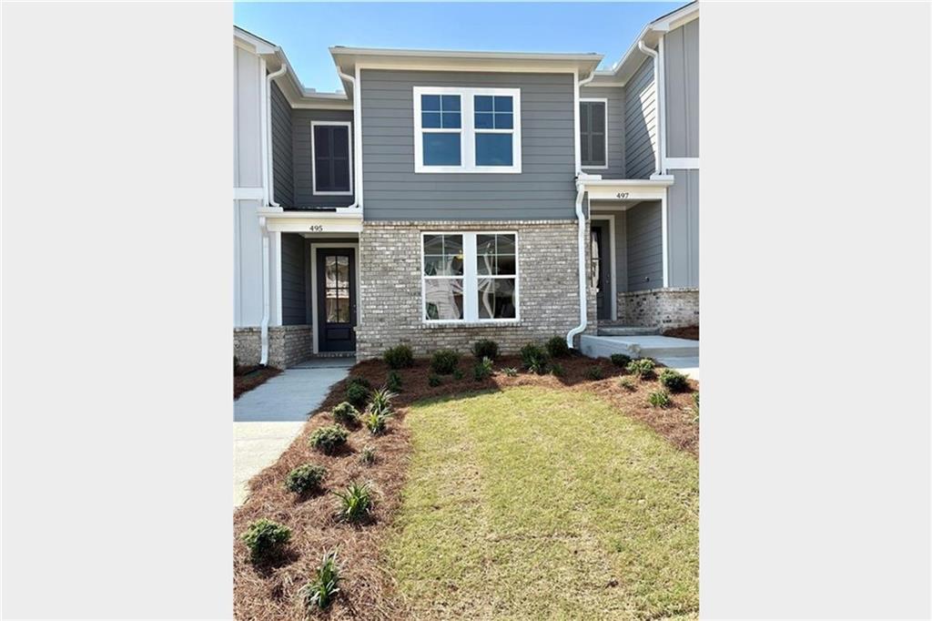 Welcome to The Monroe A in the vibrant Stegall Village, Ready Now. This 1,764 sq ft home boasts 3 bedrooms and 2.5 baths, blending style and function. Experience seamless living with a spacious, open-concept layout featuring a bright breakfast nook and living room connected to a gourmet kitchen equipped with Frigidaire stainless steel appliances and sleek quartz countertops.
Upstairs, the primary suite offers a retreat with a tray ceiling and a luxurious bath featuring a semi-frameless shower door. Two additional bedrooms provide ample space for comfort. Noteworthy upgrades include the Savannah package with 42" white kitchen cabinets and an electric linear fireplace for cozy evenings.
A 1-car garage and a 2-car parking pad offer convenience. Enjoy community amenities like a pool, clubhouse, and scenic views, enhancing your living experience. Embrace a perfect blend of elegance and comfort, and schedule your visit today! (Progress photos of Actual home. Additional interior photos are of Wilmington Model and are for illustration purposes only)
• Mountain views with quick access to I-75 compared to the competition.
• Better floorplans, with our 2-story product the layouts do feel larger than the competition.
• One of few communities that offer quartz and slide in ranges as an included feature.
• Clubhouse / Swim community with one of the lowest HOA fees for TH in the area.
• Discover a superior location that offers effortless access to I-75, as well as the vibrant downtown Emerson / Cartersville area —setting us apart from the competition. Our thoughtfully designed two-story floor plans provide a sense of spaciousness that truly outshines other offerings in the area. Additionally, we are one of the few communities to feature one car garages with additional parking pad for ease of entry and exit, our luxury kitchen with stainless steel Frigidaire appliances, quartz countertops and large island are perfect for culinary enthusiasts. We are an all-electric living community with stunning views of hilltops and valleys you can enjoy luxurious living without compromise.
Call today for exciting new deals!