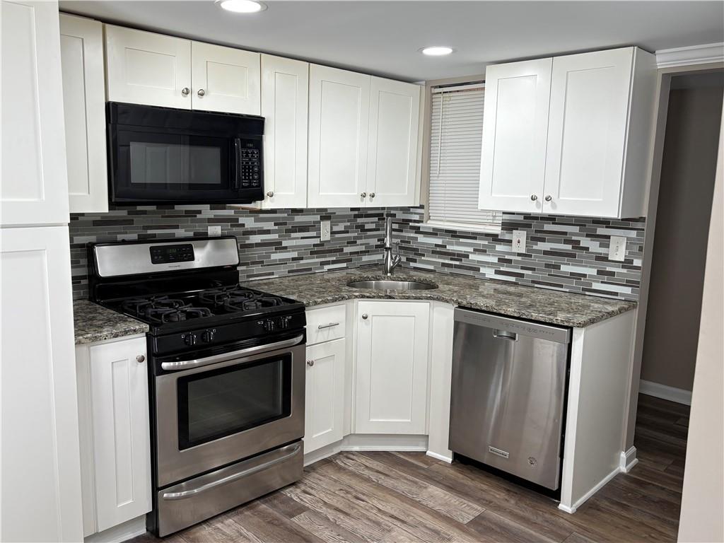Updated quiet 2 bedroom, 2 bath condo located on the bottom floor. of well desired community in Marietta. located off Powers Ferry Rd, near shopping, parks, restaurants, and Battery park- home of the Atlanta Braves. The property includes fresh paint, new LVP floor, fireplace, private deck, updated kitchen with large pantry area, extra storage in sun room area, sunroom/flex room. Separate dining area overlooking fireplace and large common area. Washer/ Dryer included with lease. Water and trash utilities included with lease. Tenant would put gas, electric and WIFI-Cable in their name . Ready to move in. Owner is looking for 12 month lease, one month security deposit, credit and background reports required. Community has clubhouse, community pool and several beautiful open green spaces, nested around trees and woods.