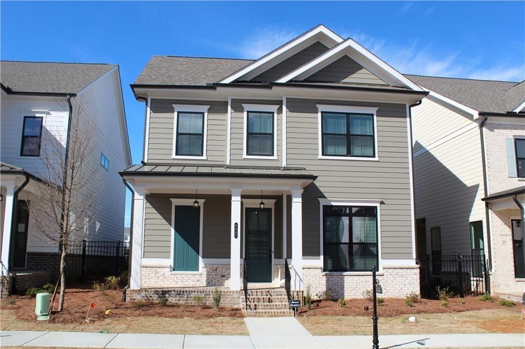 4BR, 3.5BA single family home in the highly coveted & gated Millcroft subdivision in Buford, GA! High ceilings on both the lower & upper level. Master suite is located on the main level, equipped with a large walk-in shower in the master bathroom. Kitchen features quartz countertops, white cabinets, and large island with driftwood stain overlooking the family room with a cozy fireplace, perfect for entertaining. Upper level has an additional 3 bedrooms and 2 bathrooms. There is an outdoor storage shed that is attached to the home as well.