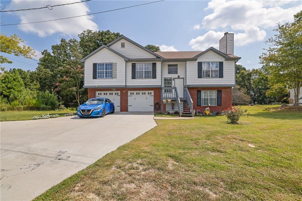 Nestled in the heart of Flowery Branch, this beautifully remodeled 4-bedroom, 3-bathroom home offers a perfect blend of modern updates and classic charm. With both a living room and a family room, there's plenty of space for relaxing and entertaining. The property features a versatile layout with a potential mother-in-law suite, making it ideal for multi-generational living or extra privacy. Situated on a large lot, the expansive yard provides endless possibilities for outdoor enjoyment or future expansion. Conveniently located near major roads, shopping, dining, and recreation, this home offers both comfort and convenience. Don't miss the chance to make this gem your own—schedule a tour today!