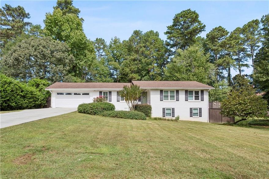 Welcome to 2995 Haverford Lane! This charming 3 bed 2 bath home features an open concept floor plan while sitting on a large private lot with direct access to Terrell Mill park. The updated well equipped kitchen is very efficient and opens up to the cozy family room. The formal dining can be found at the front of the home with a picturesque view of the front yard. The home also has a spacious home office/ kids play room adjacent to the family room. The well maintained backyard features an entertainer's deck perfect for large gatherings or quiet evenings after work. The large flat yard is a blank slate to create an outdoor oasis or an addition for more space. As mentioned the home boarders Terrell Mill Park and is one of the few homes that has direct access to all the park has to offer. At the end of the long straight driveway you will find the spacious garage with a 3rd paved car spot along the side of the home. The basement offers unfinished space great for storage or an opportunity to add additional living space.