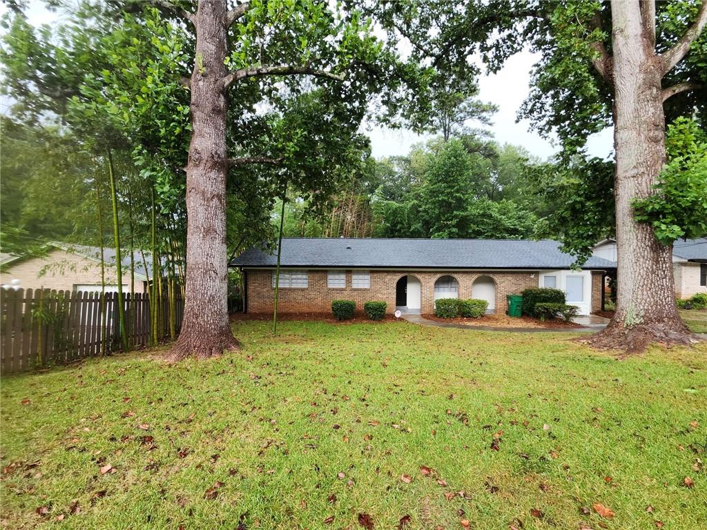 Welcome to this charming classic ranch-style 4-bedroom, 2-bathroom single-family home, perfectly located just minutes from downtown Atlanta. Nestled in a quiet, tree-lined neighborhood, this home offers the perfect blend of convenience and tranquility.
Inside, you'll find a spacious and functional layout with ample natural light, comfortable living spaces, and room to personalize. The kitchen opens up to a cozy dining area, ideal for family meals or entertaining guests.
Step outside to a generous backyard—perfect for hosting gatherings, gardening, or enjoying quiet mornings. Commuting is a breeze with a 5-minute walk to public transit and quick access to I-20 and I-285, putting everything Atlanta has to offer right at your fingertips.
Outdoor enthusiasts will love nearby Exchange Park, just a short stroll away, offering walking trails, playing fields, and plenty of space for soccer, jogging, or relaxing in nature.