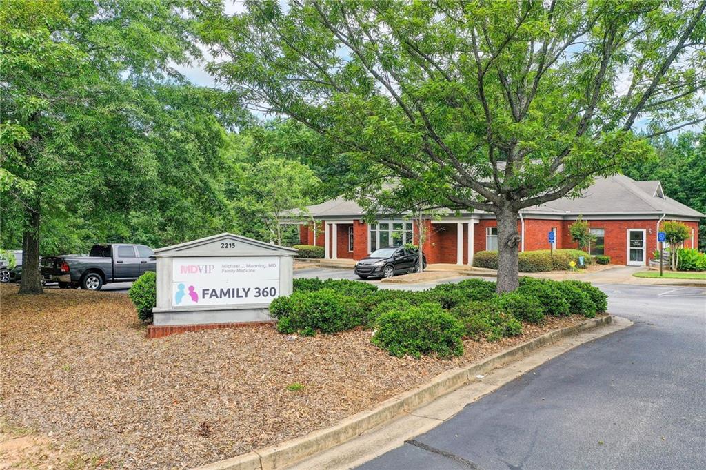 Fantastic opportunity to own your own office/medical building in Conyers! Headquarter your business or lease the available space for a great return on your investment. The property features over 5,000 sq ft on the main floor and approximately 3,000 in the basement level. The
property is currently built out for medical use but can easily be transformed to any use under the OI zoning for Rockdale County. Enjoy the peace of mind with owning this solidly constructed office built in 2002. This building is equipped with 3 separate heating and cooling units, gas hot water heater, and currently wired for phones and internet use that is sure to meet all your business needs. Start off with an established tenant already in place, as the current owner would remain with a lease in place after the sale. Owner would occupy/lease about 1,700 square feet of the building paying market rate for the next 2-3 years.