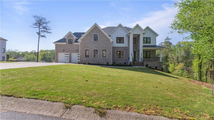 **NEW CONSTRUCTION** Discover unparalleled luxury living in the esteemed Indian Hills subdivision, and the highly rated award-winning East Cobb Schools, including Walton High School. The combination of a prestigious community and top-tier schools further enhances the appeal of your dream home's location, making it an even more desirable place to live and raise a family. The combination of the German-made Trocal 70 AD window system for optimal sunlight distribution and the overall design that emphasizes open spaces and natural light is truly impressive. The high-end finishes, and built-in features throughout the house add to its sophistication and elegance. The spacious and open floor plan lends itself to both entertaining and comfortable family living, creating a warm and inviting atmosphere. The emphasis on natural light not only enhances the aesthetic appeal but also contributes to energy efficiency by reducing the need for artificial lighting and heating. The master suite, with its luxurious bathroom, offers a true sanctuary for relaxation. The other bedrooms and bathrooms continue the theme of spaciousness, natural light, and opulent finishes, creating an environment reminiscent of a spa. The vivid picture of a thoughtfully designed and meticulously crafted dream home showcases impeccable taste and attention to detail. It's sure to be a space that not only impresses your friends and family but also provides you with the utmost comfort and enjoyment.