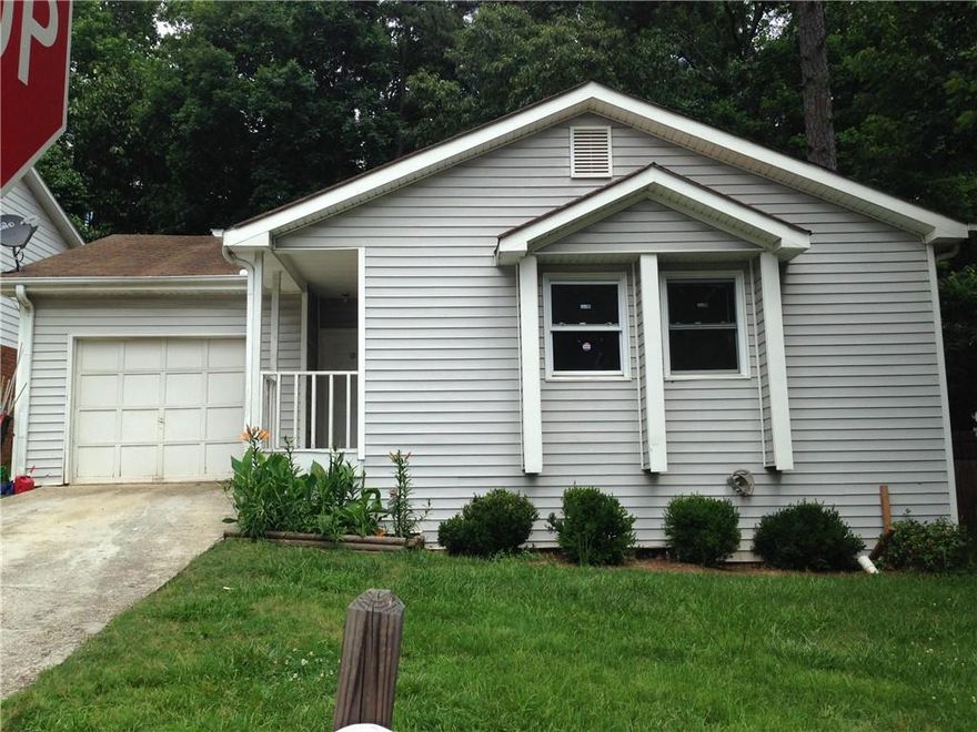 Charming ranch-style home featuring 3 bedrooms and 2 baths in a convenient Stone Mountain location! This well-maintained property offers a spacious split-bedroom floor plan with neutral carpet, abundant closet space, and a cozy fireplace. The kitchen features classic white cabinetry, and the home includes a separate laundry room for added convenience. Enjoy outdoor living on the private patio and fully fenced backyard — perfect for pets! Located near Wade Walker Park, MARTA, and Stone Mountain schools. Pet-friendly and move-in ready!
