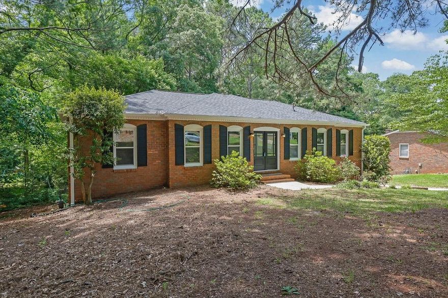 Welcome to your dream home in the heart of Hidden Hills! Nestled in a peaceful, tree-lined neighborhood just off Piedmont Ave, this charming, newly renovated all-brick ranch offers the perfect blend of comfort and style. From the moment you step inside, you'll feel the warmth and openness of the living spaces, featuring a generous living room and a cozy family room with a beautiful fireplace—ideal for both quiet moments and lively gatherings.
The brand-new kitchen is a true centerpiece, with gleaming granite countertops, stainless steel appliances, and plenty of space for culinary creativity. With 3 inviting bedrooms and 2 full baths on the main level, plus an additional bedroom and game room with a convenient Jack and Jill bath, there’s room for everyone to spread out and relax.
Step outside to your private, level backyard and enjoy a peaceful retreat on your new deck. Whether you're hosting friends and family, tending to your garden, or simply unwinding in the tranquility of nature, this outdoor space is perfect for every occasion. And with an oversized two-car garage, there's plenty of space for all your needs.
This home is the turnkey, easy-living haven you’ve been searching for. Schedule a tour today and come experience all the warmth and charm this special home has to offer!