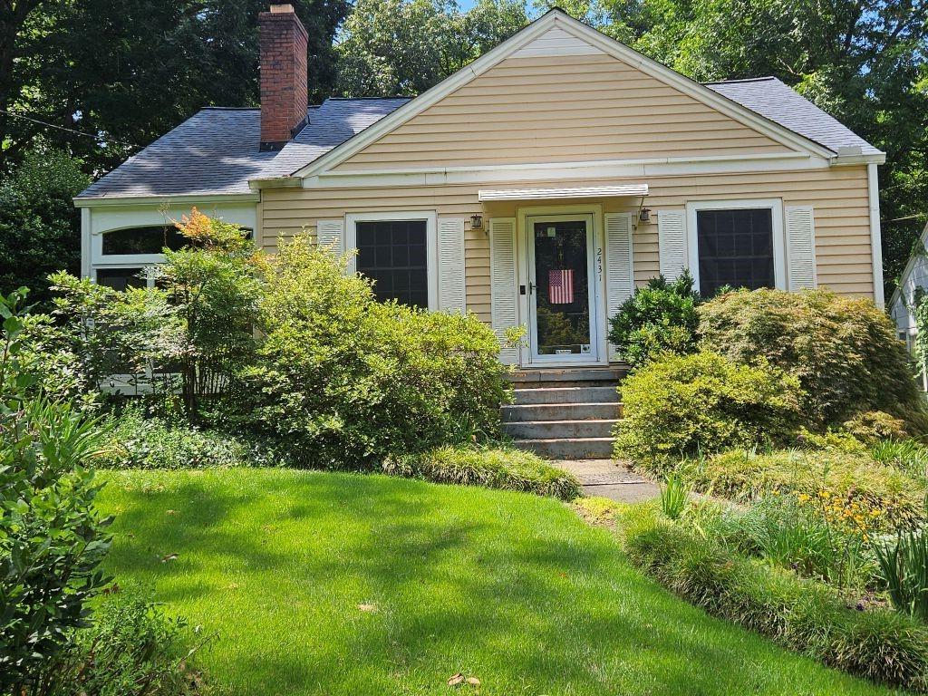Loads of charm and a beautifully landscaped yard is abundant in this bungalow. The fireplace in the Living Room welcomes you. Walk through the separate Dining Room to the side porch, a relaxing place with lots of windows to take in the beauty of the outdoors. The Kitchen is spacious enough to add a table for an eat-in breakfast area. Each bedroom is a good size with its own bathroom. One of the charming features of the home is a little telephone niche in the hallway off the living room. There are permanent stairs to the attic which has had some finish work done. The roof and HVAC are between 6 and 7 years old, the water heater is 9 months old. There is a one car garage in the back yard and plenty of driveway space for parking. Also, there is a little grilling deck with a pergola in the back yard. This is a great opportunity for the person starting out with their real estate investment to buy a cute house that is in need of cosmetic updating with equity building potential.