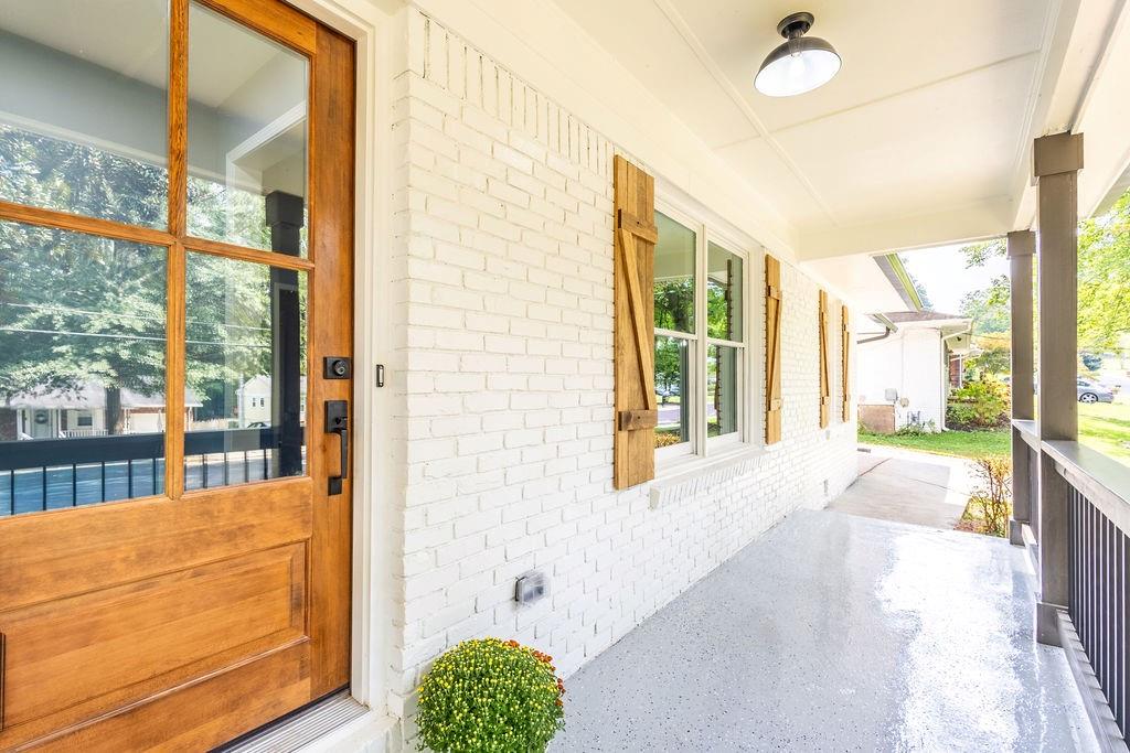 Look no further! This home has been brought back to life, where no detail has been spared. Home has been completely remodeled including new electrical, plumbing, and HVAC. When you walk in the front door you are met with an open concept main living and kitchen area creating an open and airy feel. The kitchen has new shaker custom cabinetry, quartz countertops with a farmhouse sink that brings everything together. There is new LVP flooring throughout the home, while each bathroom is finished with large luxury tile to offer an elegant finish. Master bathroom includes double vanity and the oversized master suite offers a spacious walk-in closet. Outside, the home is complete with a brand-new double-wide driveway, along with freshly landscaped front and back yards. All work Has Been Fully Permitted with the City of Smyrna. This home offers modern convenience with high-end finishes. Location, Location, The Braves Stadium is just 5 mins down the road! Come take a look today!