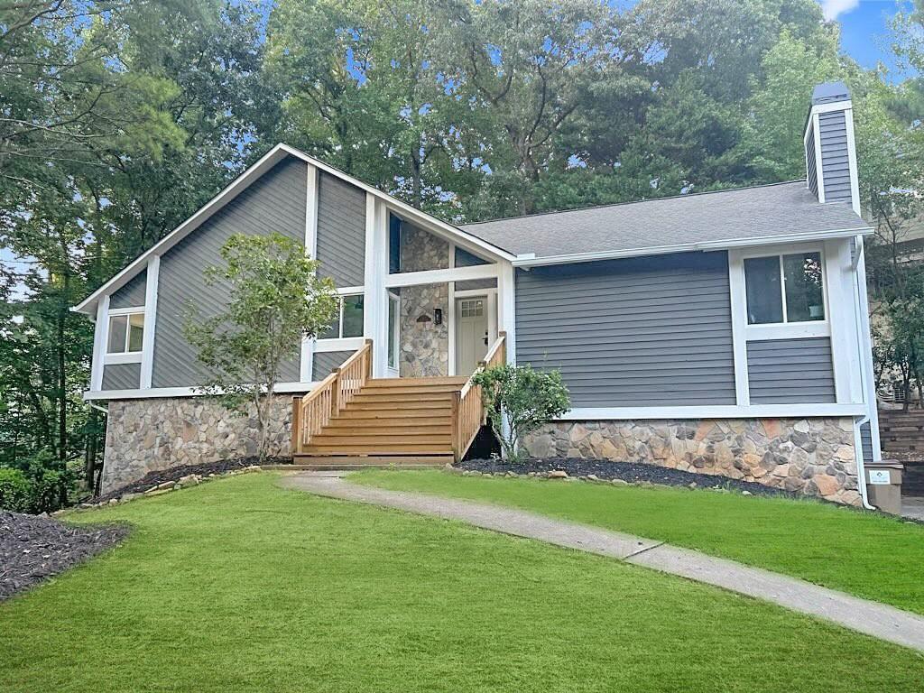 This beautiful fully renovated home in the highly sought after neighborhood, Dover Crossing, is in the heart of East Cobb, offering excellent schools, a convenient location, and modern upgrades throughout. The open-concept 5-bedroom, 3-bath home is filled with exceptional features, natural light and peaceful views, creating a warm and inviting atmosphere. The spacious master suite features a fireplace to wind down, an oversized, spa-inspired shower and a huge walk-in closet. Upstairs there are two additional bedrooms, one with its own en suite bathroom, both flooded with natural light. The versatile lower level can function as an in-law suite, guest retreat, or multi-generational living space. Recent renovations including all new HVAC, new windows, appliances, updated electrical and plumbing, ensures comfort and efficiency for years to come. Also, enjoy the vibrant community with a neighborhood pool, tennis and a welcoming neighborhood atmosphere with year-round organized events. Conveniently located near shopping, dining, and recreational parks, this home perfectly blends modern living with East Cobb charm.