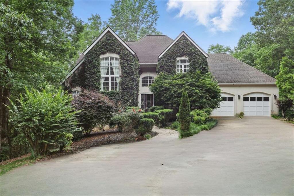 Motivated Sellers Entertaining All Offers!
Riverfront retreat in the Northeast Georgia Mountains! Nestled along the picturesque Chattahoochee River, this stunning 4-bedroom, 4.5-bathroom home offers an unparalleled blend of natural beauty and modern comfort. Located in the heart of the Northeast Georgia mountains, this property boasts prime riverfront access, perfect for fishing, kayaking, and tubing right from your backyard. Step inside to a grand two-story foyer and living room, featuring elegant wrought iron stairs and a balcony that overlooks the inviting open spaces. The kitchen, designed for both beauty and functionality, offers river views, stainless steel appliances, and granite countertops-perfect for entertaining or quiet mornings. The spacious primary bedroom on the main level is a private oasis, complete with an ensuite bathroom and a large walk-in closet. Upstairs, you'll find three generously sized bedrooms with a shared bathroom, providing plenty of room for family and guests. The terrace level opens directly to the outdoors and offers endless possibilities-whether you envision a game room, family area, or an additional bedroom, this space adapts to your needs. Enjoy breathtaking views of the river from your porch, creating the ideal setting for relaxation or hosting gatherings. This home is more than a place to live; it's a lifestyle. Schedule your showing today and experience the tranquility and adventure this prime riverfront property has to offer!