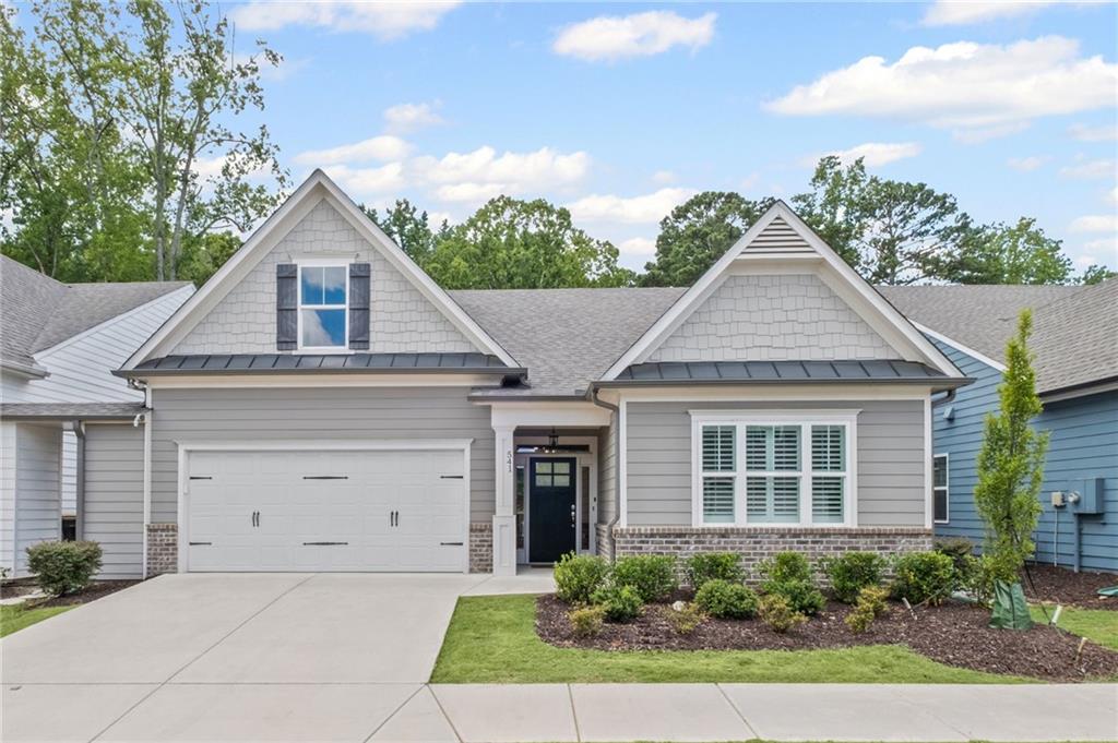 This is one-level living at its best in one of the truly step-less homes in Villas at Presley Lake. If you're seeking a home in immaculate condition with a like-new feel, don’t miss this opportunity. The open floor plan and 10-foot ceilings create a spacious living area. The primary suite, which includes a custom walk-in closet, is located at the back, offering an unobstructed view of the woods behind the home and a sense of privacy. This same view can be enjoyed from the sun porch addition. The kitchen features a large island, plenty of counter space, and a walk-in pantry. Appliances are Energy Star certified. Lawn maintenance is taken care of by the HOA. The location is unbeatable with easy access to downtown Woodstock, I575, and it’s not far from downtown Roswell.