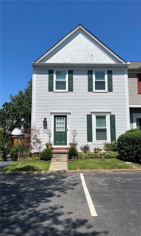 Welcome to this fully renovated, move-in-ready end-unit townhome featuring 2 bedrooms, 2.5 bathrooms, and a rare full finished basement. The main level offers premium LVP wood flooring, an oversized family room, upgraded half bath, separate dining room, and a newly renovated kitchen with quartz countertops, stainless steel appliances, gas range, new cabinets, and tile flooring. Upstairs, both oversized bedrooms include custom walk-in closets and ensuite bathrooms, with the primary bath featuring marble tile and other upgrades for a spa-like feel. The finished basement includes a large living area, a separate room ideal as a 3rd bedroom, office, or gym, and is stubbed for a full bath which would be perfect for an in-law suite. As an end unit, enjoy added privacy, a spacious yard, two assigned parking spaces, plus a third space directly in front. HOA covers exterior landscaping and maintenance of the community pool. Community is beside Morton Road Pocket Park with walking trails, oversized playground, half basketball court, pavilions and much more. This well-maintained home is priced to sell, so act quickly and don’t miss out.