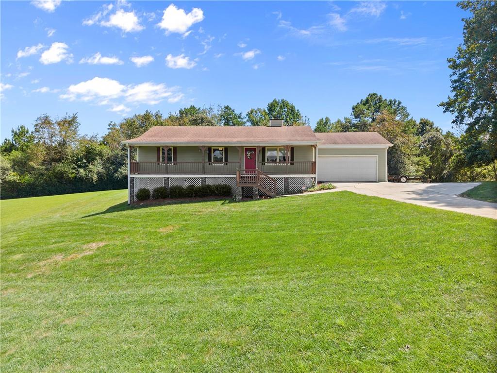 Welcome to 4006 Summit Chase, where modern updates meet outdoor living on nearly an acre in Gainesville. This fully renovated 3-bedroom, 3-bath home offers both style and functionality, with bonus finished basement space and a backyard designed for year-round enjoyment.
Inside, you’ll find a completely remodeled kitchen with quartz countertops, custom cabinetry, subway tile backsplash, and an oversized island — perfect for gatherings. The living room features a stacked-stone fireplace and crown molding, while new flooring and updated paint run throughout the main level. Each bathroom has been fully renovated, including a spacious walk-in shower in the primary suite.
The finished basement adds two versatile rooms ideal for a home office, gym, or guest space, plus additional storage and a full bath.
Step outside and discover your own private retreat: a sparkling pool with a brand-new liner and pump filter, flagstone-covered patio with an outdoor stone fireplace, a built-in Big Green Egg, and a permanent awning for shaded dining. The fenced backyard also includes a half-court basketball area and plenty of room for play or pets.
Additional highlights include newer Hardiplank siding and windows, a roof approximately 10 years old, a 2-car garage with storage, and city water service with Jackson EMC power and Spectrum internet. Septic was just pumped/inspected and fill lines were replaced just five years ago, and an integrated security system is already in place.
Situated on ±0.83 acres in a quiet neighborhood, this home combines modern convenience with outdoor living — a rare find in today’s market.