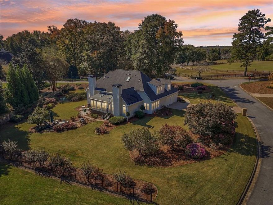 Fantastic Opportunity to Live in the Sought After Golf/Swim/Tennis Community of Polo Golf and Country Club! This Wonderful 4BR/3.5 Bath Home Features a Master Suite on Main, Vaulted Great Room, Keeping Area w/Fireplace, Beautiful Tiled Sunroom Addition, 3 Guest Suites up with Two Full Baths and Sits on a Spectacular Corner Culdesac Lot w/Flagstone Grilling Area! This Bright Open Floorplan has Beautiful Hardwood Floors, Vaulted Great Room and Plantation Shutters! Chef's Kitchen w/Stainless Steel Appliances, Built-n Microwave, Wall Oven, Separate Gas Cooktop, Wine Cooler, Custom White Cabinets, Tiled Backsplash, Breakfast Bar, Desk Area, Walk-in Pantry and Cozy Breakfast Area w/Chandelier. Vaulted Keeping Area w/Stackstone Fireplace and Ceiling Fan. Spectacular Tiled Sunroom with Skylights, Ceiling Fan and Custom Blinds Makes Addition Perfect for Morning Coffee or Unwinding in the Evening While Overlooking Your Private Backyard Oasis with Luxurious Landscaping and Flagstone Patio Addition w/Gas Grill. Oversized Master Suite on Main w/Dual Tray Ceilings, Fireplace and Ceiling Fan. Master Spa with Dual Tray Ceiling, Custom Dual Vanities, Tiled Floor, Jetted Tub, Tiled Shower and Walk-in Closet!