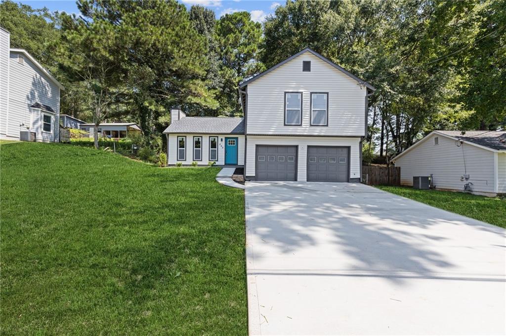 MOVE-IN READY, FULLY RENOVATED & UPGRADED HOME IN SOUGHT-AFTER LILBURN! THIS 3 BED | 2 BATH SPLIT-LEVEL HOME IS SITUATED IN A QUIET, ESTABLISHED NEIGHBORHOOD. FEATURING A NEW ROOF, NEW WATER HEATER, NEW DRIVEWAY, NEW DOORS & WINDOWS, NEW LVP FLOORING, AND FRESH INTERIOR & EXTERIOR PAINT. THE FULLY RENOVATED KITCHEN BOASTS QUARTZ COUNTERTOPS AND BRAND NEW STAINLESS STEEL APPLIANCES. BOTH BATHROOMS HAVE BEEN BEAUTIFULLY UPGRADED WITH NEW VANITIES, SINKS, LIGHT FIXTURES, AND MORE.
NO HOA! NO RENTAL RESTRICTIONS! PERFECT FOR FIRST-TIME HOMEBUYERS OR INVESTORS. CONVENIENTLY LOCATED JUST MINUTES FROM I-85, SCHOOLS, SHOPPING, AND DINING. DON’T MISS THIS TURNKEY GEM IN A PRIME LOCATION — SCHEDULE YOUR SHOWING TODAY!