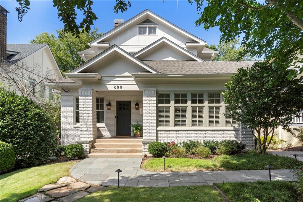 A jewel box in the heart of Virginia Highlands! Open, updated light-filled living space offers modern convenience while keeping the charm of the original home. Primary on main with beautiful bath. 3 additional large bedrooms upstairs with 2 baths and large laundry room. Plenty of storage in the lower level with additional laundry area. Plus separate apartment great for guests or even a tenant. Pool and back yard is perhaps the best part! Exterior living space with automatic screens, TV and kitchen. This one has it all and you are steps from all of the charm of the neighborhood and a few blocks from the belt line.