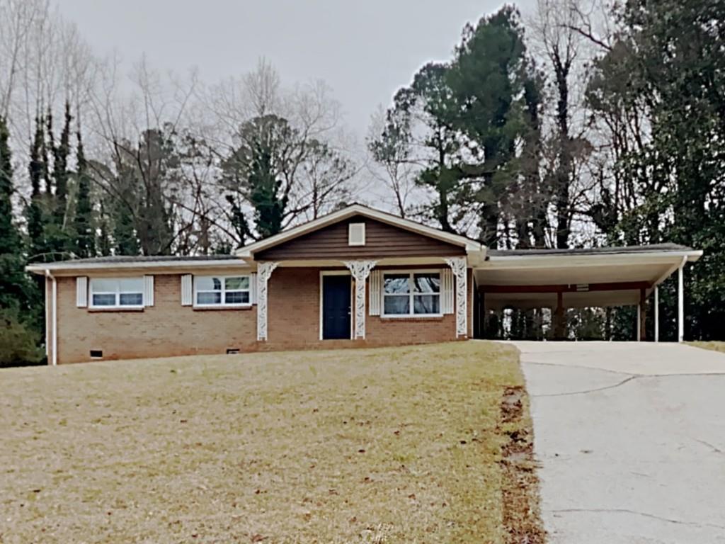 Beautiful ranch home in Chestnut Log subdivision! Located on almost half an acre (0.4581)! Covered porch! Spacious living room! Separate dining room off kitchen! Kitchen features white cabinets, stone counters, and stainless steel appliances! Three spacious bedrooms, one full bathroom, and one half bathroom! Lots of cleared backyard space! Double carport! A must see! Submit your offer today!