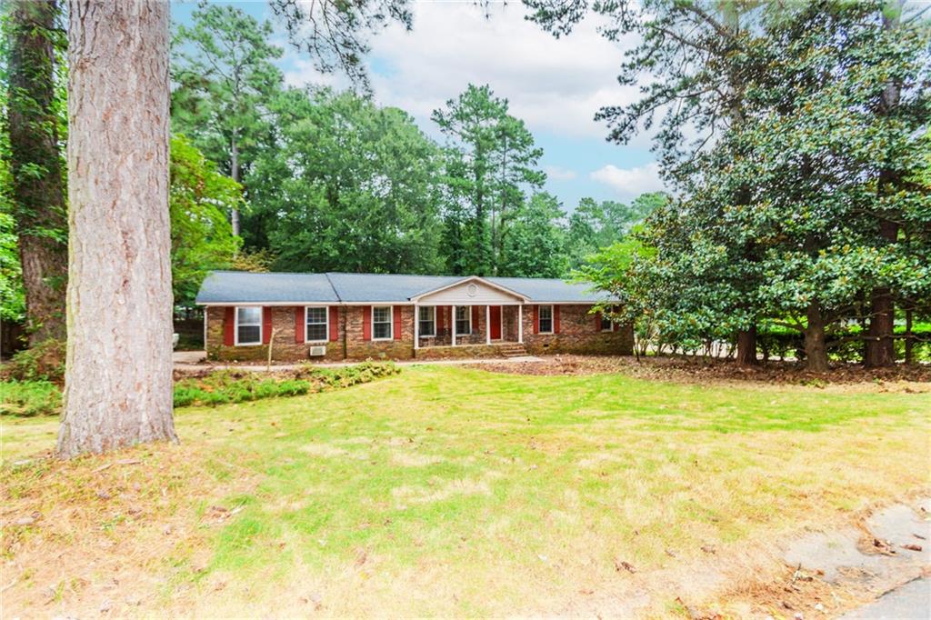 **RARE OPPORTUNITY in the Heart of Athens!**
Unlock the full potential of this stately brick home, perfectly situated just 4 miles from the University of Georgia campus. Nestled on a private, wooded **half-acre lot**, this hidden gem offers peace, privacy, and endless possibilities to create your dream home.
Step onto the welcoming front porch or enjoy your morning coffee from **not one, but two screened-in porches**—one just off the family room and the other off the oversized primary suite. Inside, the spacious main level boasts an **open-concept kitchen and dining area**, ideal for entertaining, along with a formal living room and a cozy family room complete with a charming fireplace.
You’ll find four generous bedrooms and three full bathrooms, including a **massive primary suite** featuring a sitting room or sunroom, a huge walk-in closet, and a spacious ensuite bath.
**Brand New Roof Just Installed!**
With great bones, classic curb appeal, and unbeatable location, this diamond in the rough is ready for your creative vision. Don’t miss the chance to transform this home into a true showstopper in one of Athens’ most desirable locations.