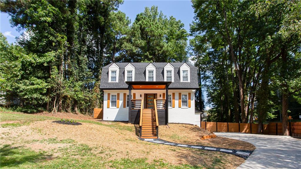 Completely renovated gem in the desired East Cobb! Embellished-top to bottom this 4-bedroom modern carriage style home sits in the desired Pope H.S. District. Walk into new LVP floors throughout w/an expansive, open concept living area w/lots of recessed lighting, and attractive electric fireplace. The highlight of this home is the “Superior Kitchen” w/a generous dining area featuring quartz countertops, high-end stainless-steel appliances, spacious island to accommodate several bar stools, upgraded self-closing cabinets and walk in pantry. Proceed upstairs to the owner's suite and make way to brand new master bath with a vast tiled walk-in shower and double vanity. Be fond of the sizable secondary bedrooms and renovated additional baths. New front/back Deck, new paint in/out, new energy saving windows, new roof, new HVAC/furnace, and new garage door. The inviting fenced backyard is fantastic for kids, pets, or to have a family outing. In close proximity to parks, the Aquatic Center, restaurants, grocery stores, shopping, and much more! This marvelous home won't last long! It's an East Cobb Dream!