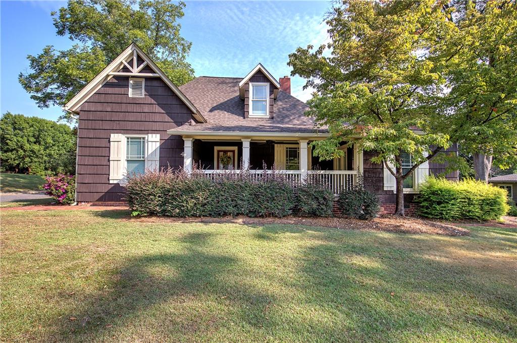 Nestled in the highly sought-after West End Historic District of downtown Cartersville, this beautifully renovated 3 bedroom, 3 bath bungalow seamlessly blends timeless 1940s charm with modern updates. Situated on a lovely corner lot, this home boasts stunning curb appeal with mature landscaping and a welcoming front porch perfect for morning coffee or evening relaxation.
Inside, you'll find a thoughtfully designed layout featuring hardwood floors, abundant natural light, and stylish finishes throughout. The main level offers an large primary bedroom with spa-like bath. Upstairs you will find two more large bedrooms with the original hardwood flooring! No carpet anywhere in the home! The renovated kitchen opens to a cozy dining space, office space and living area, ideal for entertaining and work from home!
Enjoy the ultimate in walkability with just a short stroll to the Cartersville Library, local restaurants, shops, and vibrant downtown events. Whether you're looking to settle into a quiet, historic neighborhood or enjoy all the conveniences of in-town living, this one-of-a-kind home offers the best of both worlds.
Don't miss this rare opportunity to own a piece of Cartersville history!