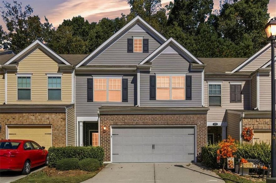 Welcome to this well-maintained 3 bedroom, 2.5 bathroom townhome located in a sought-after community in Cumming. Built in 2015, this home features an open-concept main level with hardwood flooring and a spacious family room that flows into the dining area and kitchen. The kitchen offers solid-surface countertops, stainless steel appliances, ample cabinet storage, and a convenient breakfast bar. 
Upstairs, the large primary suite includes a walk-in closet and an ensuite bath with dual vanities, separate tub and shower. Two additional secondary bedrooms share a full hall bath, and the laundry room is located conveniently on the upper level.  The upstairs loft would make a great teen hangout, playroom or office space!  A private rear patio provides space for outdoor relaxation, and the two-car garage offers secure parking and extra storage.
The community features a swimming pool, tennis courts, playground and basketball court. Conveniently located near GA-400, shopping, dining, and across the street from the aquatic center!
This property offers low-maintenance living in an excellent Forsyth County location.  Schedule your showing today to view this freshly painted move in ready home-Seller is offering a $2000 carpet allowance for buyer to take advantage of before closing!