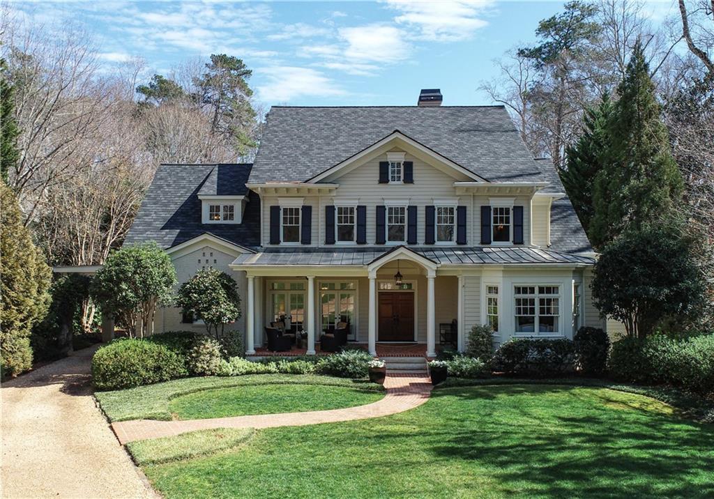 Inviting estate home, located in Historic Brookhaven and just steps from the Capital City golf course. Nestled on a beautifully landscaped and level 1.25 Acre lot, the large, private, park-like backyard has two professionally built putting greens and plenty of room for a pool and play. This house has a well thought out floor plan with an open concept, has great space with nice size rooms, but still comfortable and very livable. A few of the Special Features: Master on Main, 4 Generous Size Bedrooms up with Bonus Room, Screened-in OR Glassed-in Porch/Sunroom, 3 1/2 Car Garage, Finished Terrace Level with Wine Cellar, Game Rooms, TV Room, Bedroom/Bath, Golf Club Storage Room (also perfect for Hunting/Fishing Equipment and/or Work Shop). Heart of Pine Floors, 4 Fireplaces, Stone Terrace and More! Be sure and view the video!